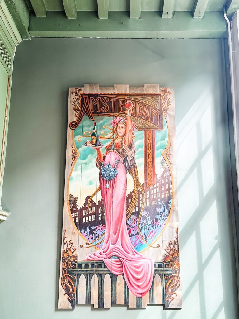Art deco style painting that reads 'Amsterdam' found in Nieuw Amsterdam bar in Amsterdam