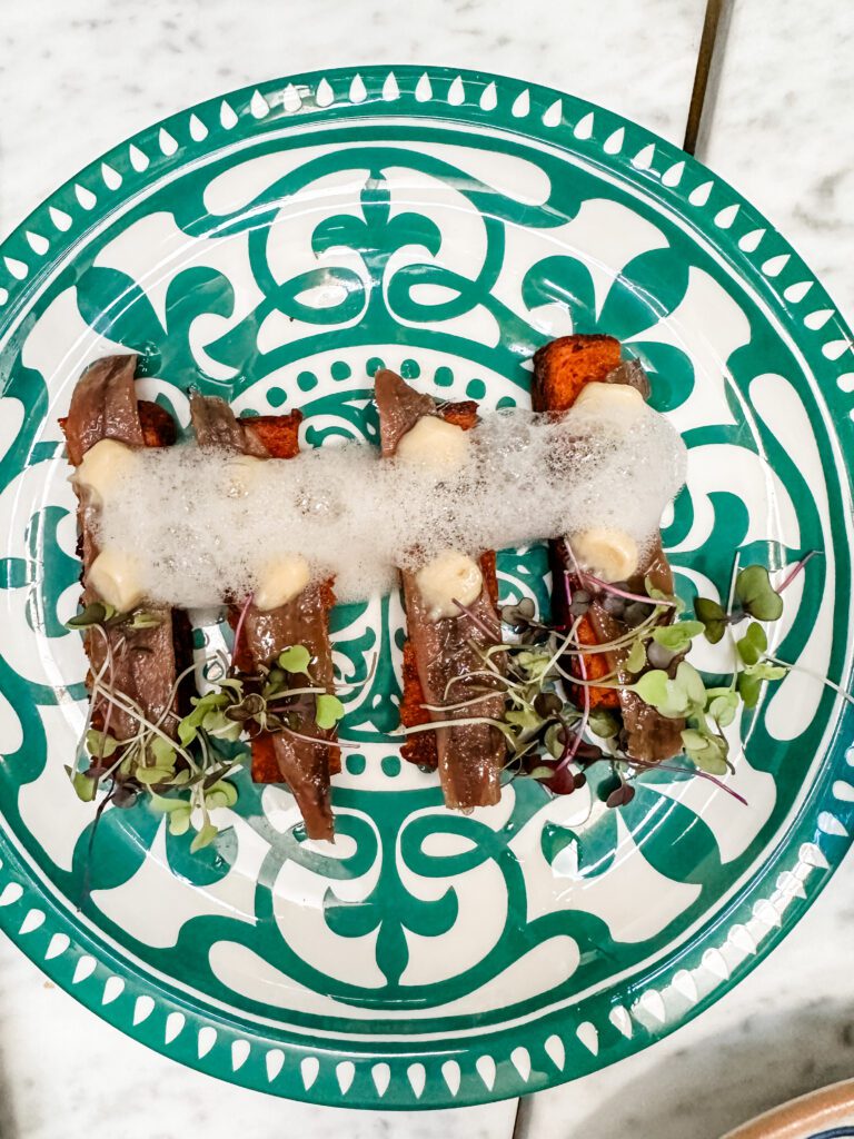 Anchovies on toast at Azahar Restaurante, Seville, Spain.