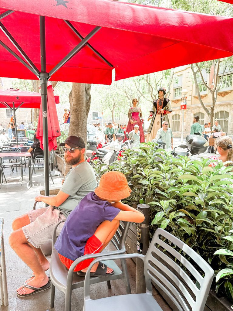 Views of Festa Major de Raval in Barcelona Spain. Aussie travellers to Spain witness Catalan culture from the breakfast table. 
