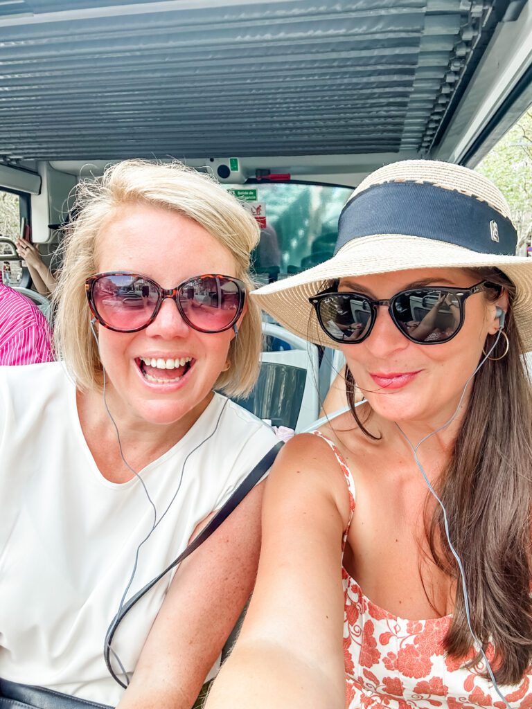 Friends reunion on the hop-on hop-off tourist bus in Barcelona, Spain