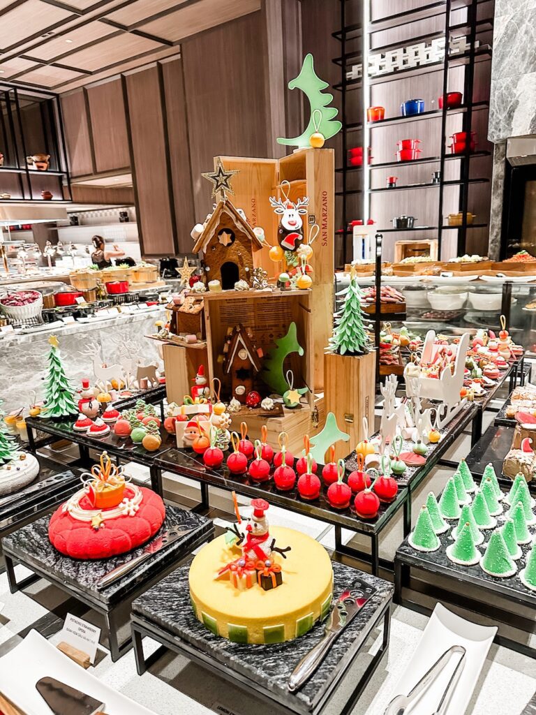 The Christmas buffet spread on Christmas Eve at Horizons Restaurant at Crowne Plaza Phu Quoc showing an array of bright coloured desserts. 