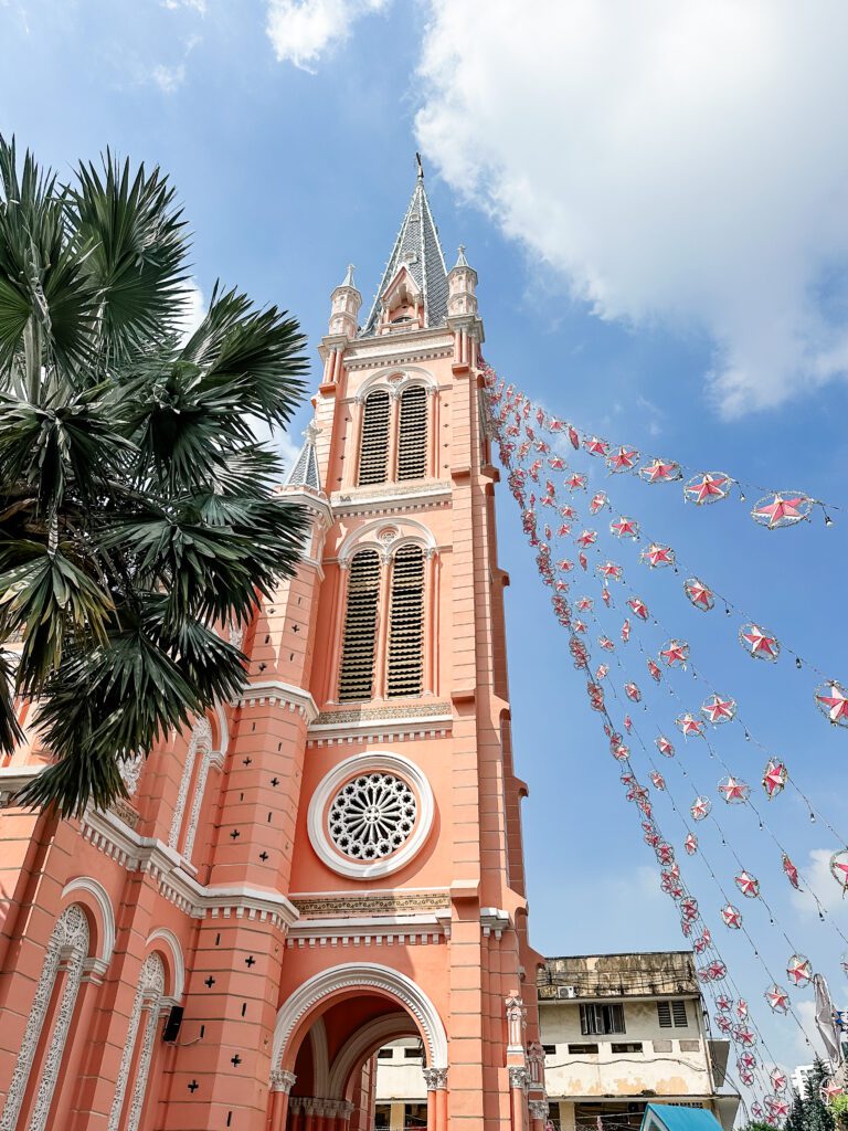 The Tan Dinh Church in Ho Chi Minh City - also know as the pink church for its vibrant pink colour, which sits against a bright blue sky. 